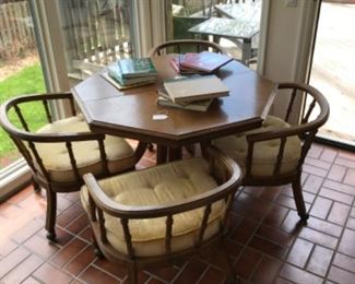 Table and 4 chairs with 2 additional leaves.
