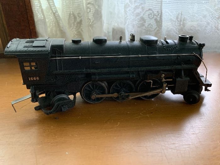 Picture 1 of 16. Vintage post-war Lionel train set from the 1940’s that includes (1) #1666 locomotive/coal tender, (1) Pennsylvania RR 477618 caboose, (1) #3444 animated Erie gondola with hobo & cop, (1) #3459 green dump car, (1) #2679 Baby Ruth box car, (1) #2680 Sunoco tank car, (1) #6080 observation car, (1) Pennsylvania 477618  Caboose, Trainmaster Transformer, 250 Watt, type ZW, (1) #304 beacon, (1) switch controller & tracks, (1) #30 water tower, (damaged), (1) Tyco steel overhead foot bridge, (many items with original boxes), assorted paper 3-dimensional buildings.   $275.
Sorry, NO TRACKS! Available for local pickup by using Contact button below.