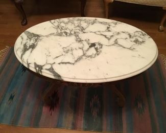 5. Oval coffee table carved apron floral design, marble top    33.5”L x 23.5”D x 17.5”H                $195
