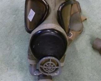 Period WWI gas mask, all intact, tagged at $32, now offered at less than half price for $15.  We just found an original green canvas bag stamped "gas mask", which may be for this, offered @ $10.