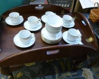 The cups/saucers are still available.  Sorry that we already sold the butler tray-style coffee table @ $40.
