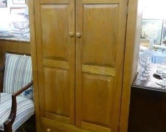 American oak later 20th century custom-made cabinet having 2 doors over bottom drawer, offered now $100.