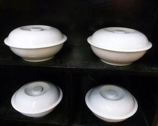 Chinese (?) large soup/stew serving bowls with lids having round disk finger grip, approx 9" diameter, offered at $12 each.