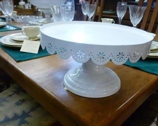 Metal pastry/cake serving stand painted white, top designed to look like a doily.  Originally tagged at $24, now offered for $10.  Would be great to present doughnuts or pastries.