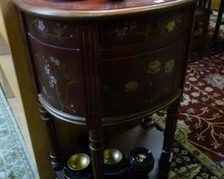 Modern demilune table with applied oxblood and goldtone color and handpainted flowers, originally tagged at $154, now offered at less than half at $70