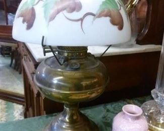 Genuine oil lamp stripped to original brass, and electrified, accompanied by handpainted ivy on milkglass shade @ $154