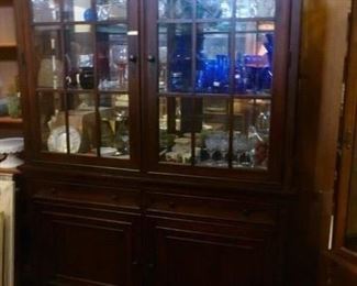 China cabinet in excellent condition, with glass shelves, originally at $494, now offered at $200 because we do not want to move it again.