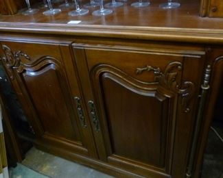 This photo shows the 2-door base portion of a wall unit in the French Provincial style.  Now offered at $150