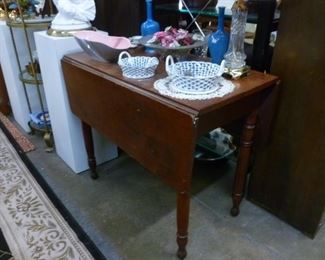 Antique 19th century American double dropleaf talbe in cherry.  Originally tagged at $294, now offered at less than half at $140