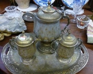 This punched and engraved brass tea set is from India, mid 20th century, offered now @ $100/set