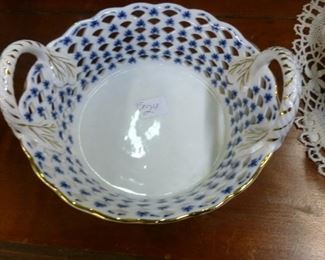 Handpainted porcelain "basket"s, which we have in two sizes now reduced to half price.