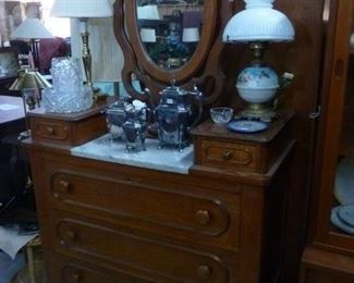 Antique American dresser with oval mirror, 2 "glove" drawers flanking white marble slab, over 3 drawers now offered at $140