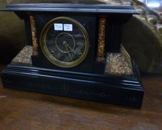 This antique mantle clock now reduced to $90.  We have key.