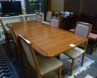 Dining table (including extension leaves) and 8 side chairs, now reduced to $250