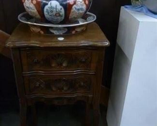 Reproduction Chinese porcelain lidded tureen with underplate now reduced to $30.  Early 20th century reproduction French 18th century walnut 2-drawer work table @ $100