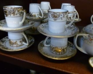 Gilt demitasse cups and saucers @ $4 per cup/saucer