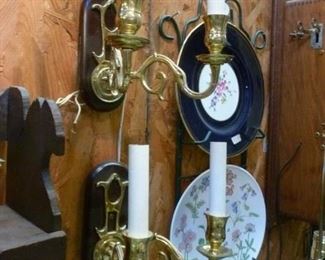Electrified pair of brass double candle sconces, each mounted on lozenge-shape back board @ $94/pair