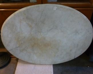 Oval marble top, approx 26" x 40" @ $100