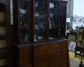 Early 20th century mahogany secretary bookcase, with elaborate decoration, offered at only $100 because we do not wish to move it again.