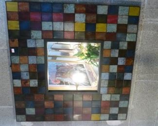 This is a colorful tile-like mirror frame, offered now at $40