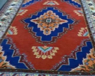 This rug has astounding color contrasts, measures approximately 10'x13', reduced from $2,300 to $900