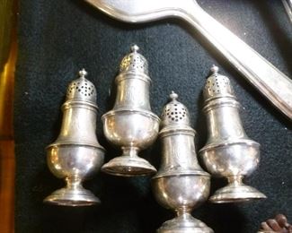 Set of four monogrammed sterling silver shakers @ $140/four