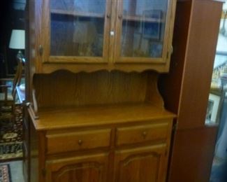 American oak 2-piece china/display cabinet, offered at $150.