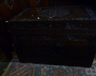 Solid teak chest with carved lid/front/sides @ $200
