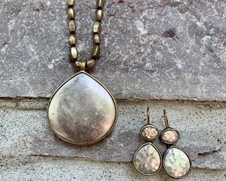 Costume Jewelry. Champaign and silver tone drop necklace with matching earrings. $10 