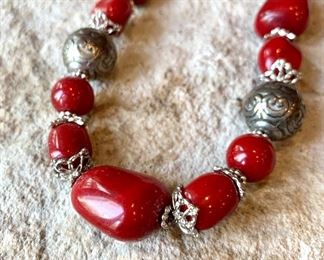 Costume jewlery. Red and silver beaded necklace. Some tarnish visible on silver. $10