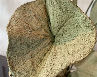 Close up of the texture on the modern greenery piece. 