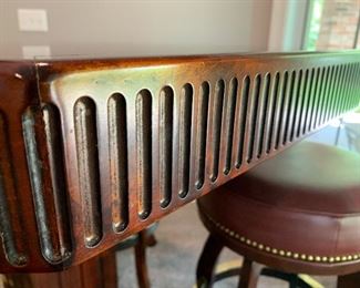 Close up showing the side detail of the pub table. 