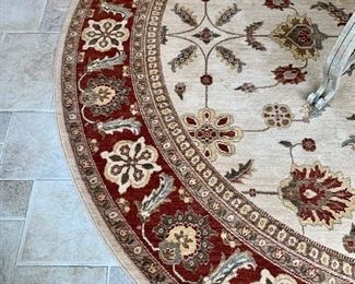 Cream and terracotta round rug $250 9 1/2’ Diameter