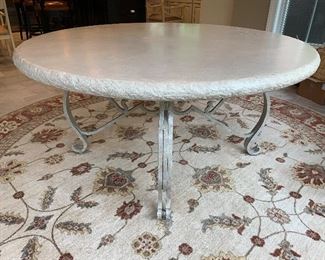 Round resin top dining table, metal base - splatter finish of beige tones. Ivory/ beige top; some condition issues from normal wear. $450 60’’ diameter