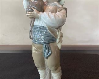 Officially marked Lladro 5 - Man with Wine Skin Excellent Condition. $70