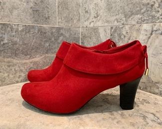 Red suede booties with bow on the back. Cute! By Coach and Four. $20
