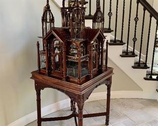 STUNNING! Mahagony bird cage. Yes, this is a REAL bird cage! Faux bird inside for grins. More images available. With base - it stands just over 6’ tall.  2.4’ W. Yours for $500. (Original bill of sale was $900) Incredible display of craftsmanship.