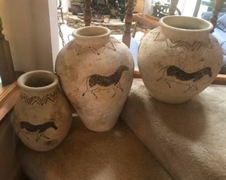 Because my house had been felled by a tree. Cool horse stoneware urns