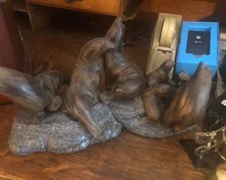His great grand father or WHATEVER. All I know is my ears began to BLEED  . . . Cool sculpture of seals