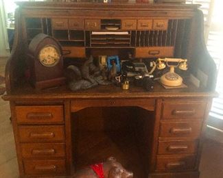 And he left my car without me having to kick him  out with my broken left foot that is encased in a cast made from melted bowling balls. Roll-top desk