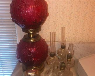 GA Power only provides the most basic of powerline-to -power-pole connection . . . fancy cathouse lamp gave birth to litter of four  cute hurricane lamps