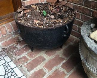 cauldron containing coagulated brew