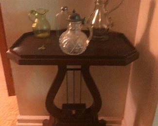 I even picked up the street signs early (don't tell Cher) and even saved time on that because there was a crusty old acid vat who lived on Powder Springs who threw our sign into the street so it could get pulverized by passing semis. (Again, don't tell Cher.) Harp table that sold