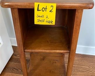 Lot 2.  $30  Sm. 2 shelf. Wood Side Table  14” W x 12” D x 17” H Great little side table with storage!
