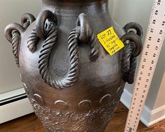 Lot 27.  $35. Large Composite Urn/Planter 31” H x 17” W at widest point. Interesting adornment in relief.  This would be a perfect vessel for a tall plant or tree, or tall dried grasses or similar.  