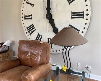 Rats, this clock is NOT for sale but it used to be on the clocktower of Sts. Peter and Paul, and it's huge.  This picture shows the leather recliner next to the glass top table and lamp. You should buy all three pieces!