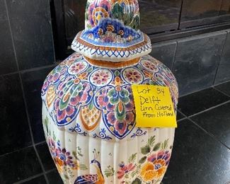 Lot 34.  $425.00. This is the"  piece de resistance" of the whole sale.  We have a gorgeous 26" high Covered Delft Pottery Urn, purchased in the Netherlands.  This urn is hand-painted by Liesbet Sanders (LS), who retired two years ago.  Similar size and decorated piece by this artist sells for $1,815 Euros.   Note the peacock and amazing colors. The Lion figurine is atop the lid.  Probably the finest and most beautiful piece of pottery I've yet to see. 