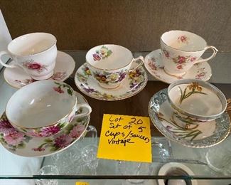 Lot 20.   $25.  Set of five bone china cups and saucers, antique, all in perfect condition