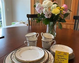 Lot 36.  $50.  Set of Gorham "Manhattan" Pattern Bone China. 4 Dinner Plates, 2 Salad Plates, 2 Bread & Butter Plates, 5 Saucers and 4 cups (17 pc set). Perfect for the couple that wants to shake things up but doesn't want to buy a honking big $450 set, lol!  This is a beautiful pattern.