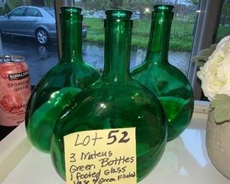 Lot 52. I think these may have been old Mateus (?) wine bottles, but I could be wrong.  They have great lines and terrific color, though.   Place on a window sill with daisies and you will love them!
